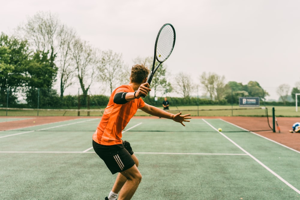 man playing tennis