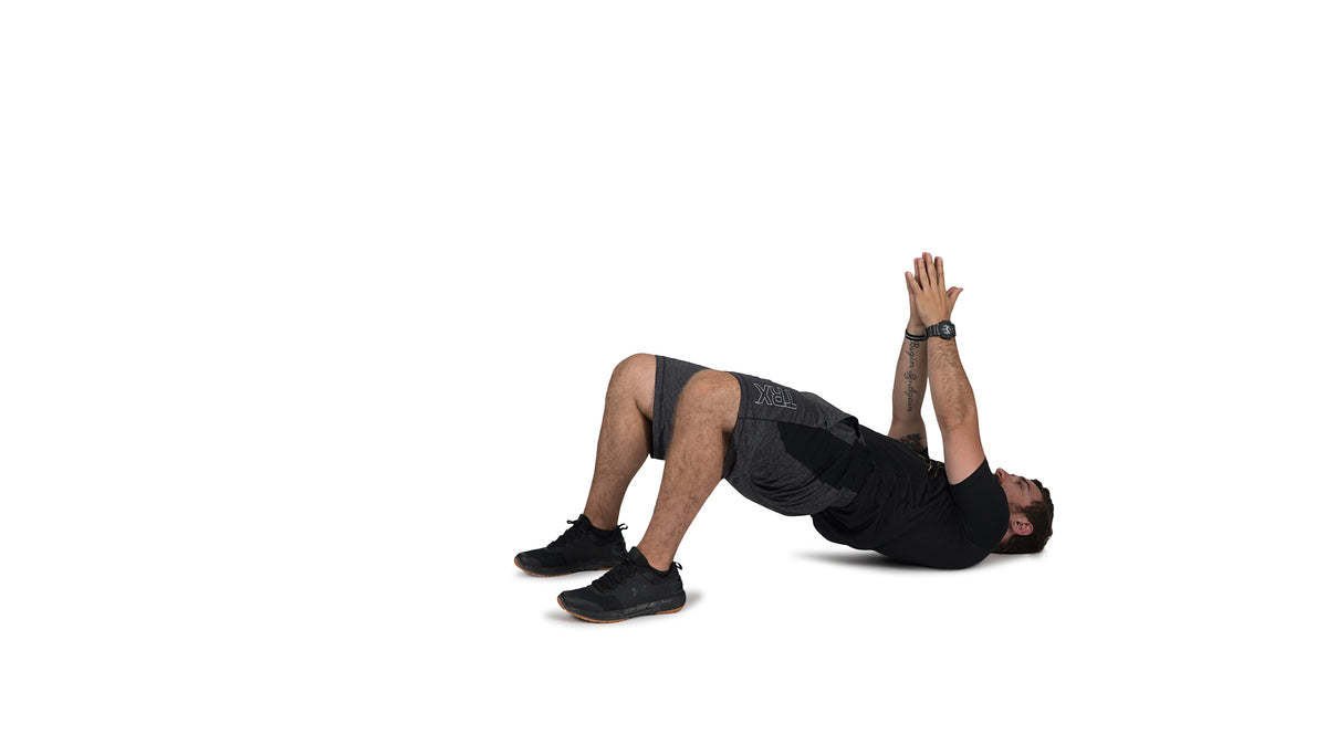 man stretching hips against white background