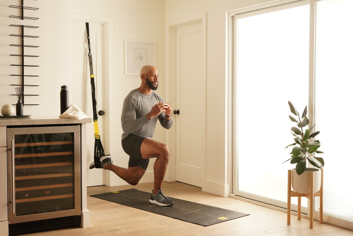 man exercising in home gym
