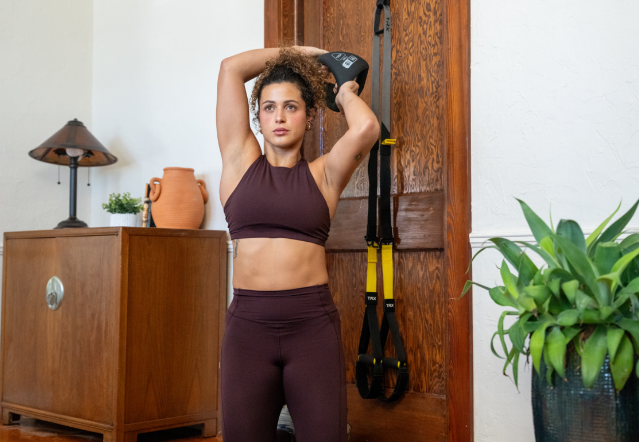 Athlete performing a hybrid training workout with suspension trainer and Ybell
